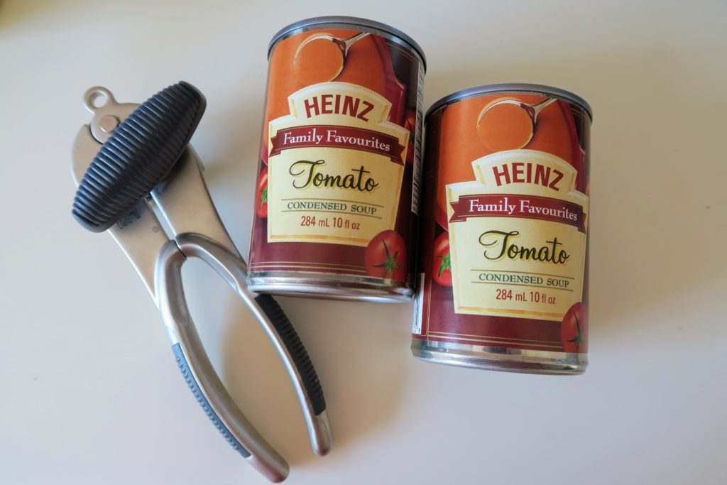 My trusty can opener with two 10 ounce cans of Heinz tomato soup