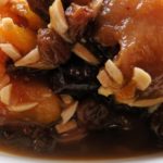 Ukrainian stewed fruit - compote with roasted almond slivers