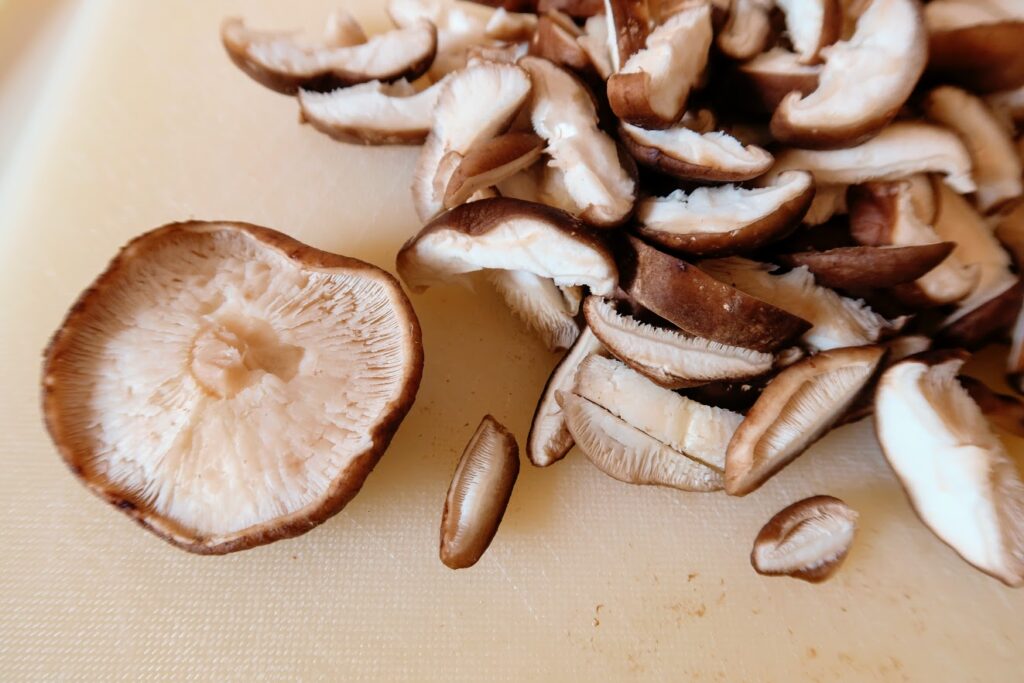 Shiitake mushrooms with stems removed sliced into strips