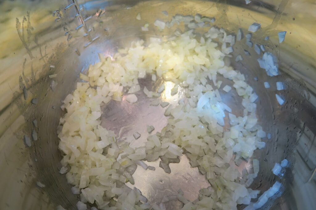 Onion being cooked in the Instant Pot
