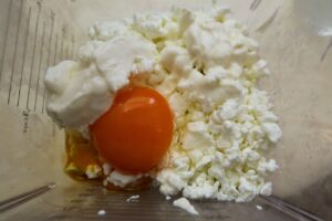 Dry curd cottage cheese with 2 egg yolks and sour cream