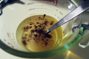 Combining marinade ingredients in a measuring cup
