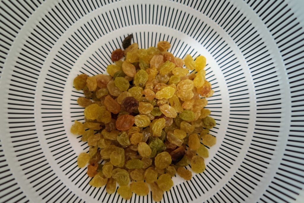 Golden raisins in a colander 